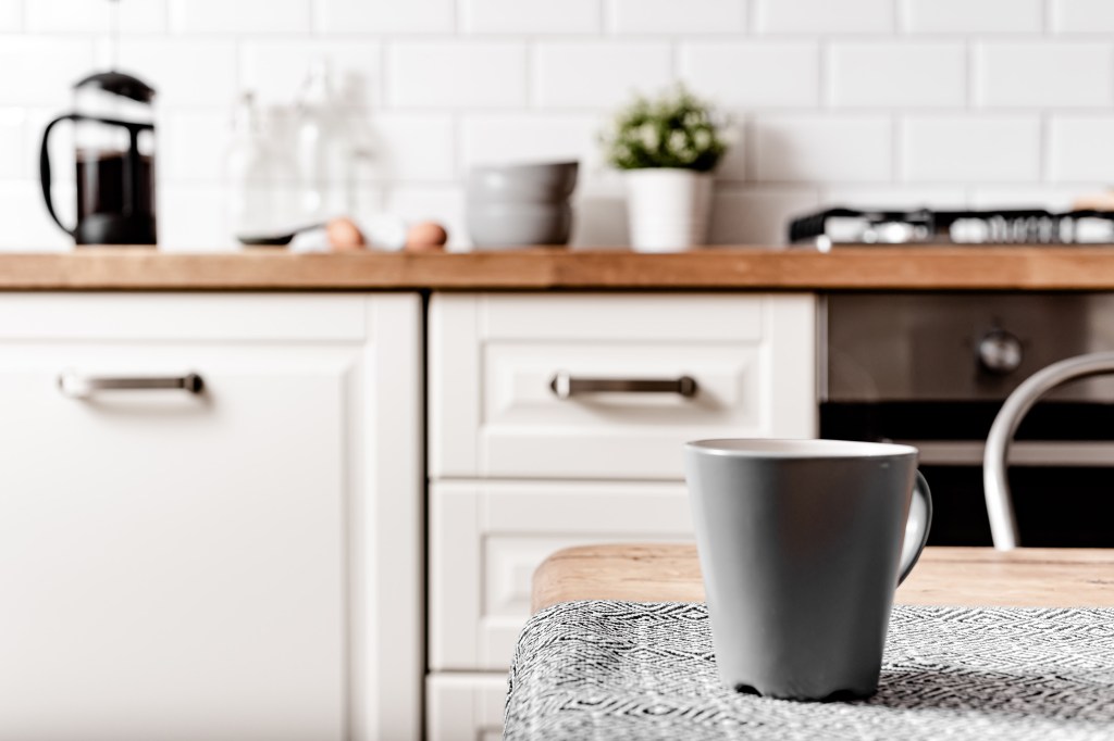 Kitchen corner with mug, the comfort of a home base for part-time digital nomads.